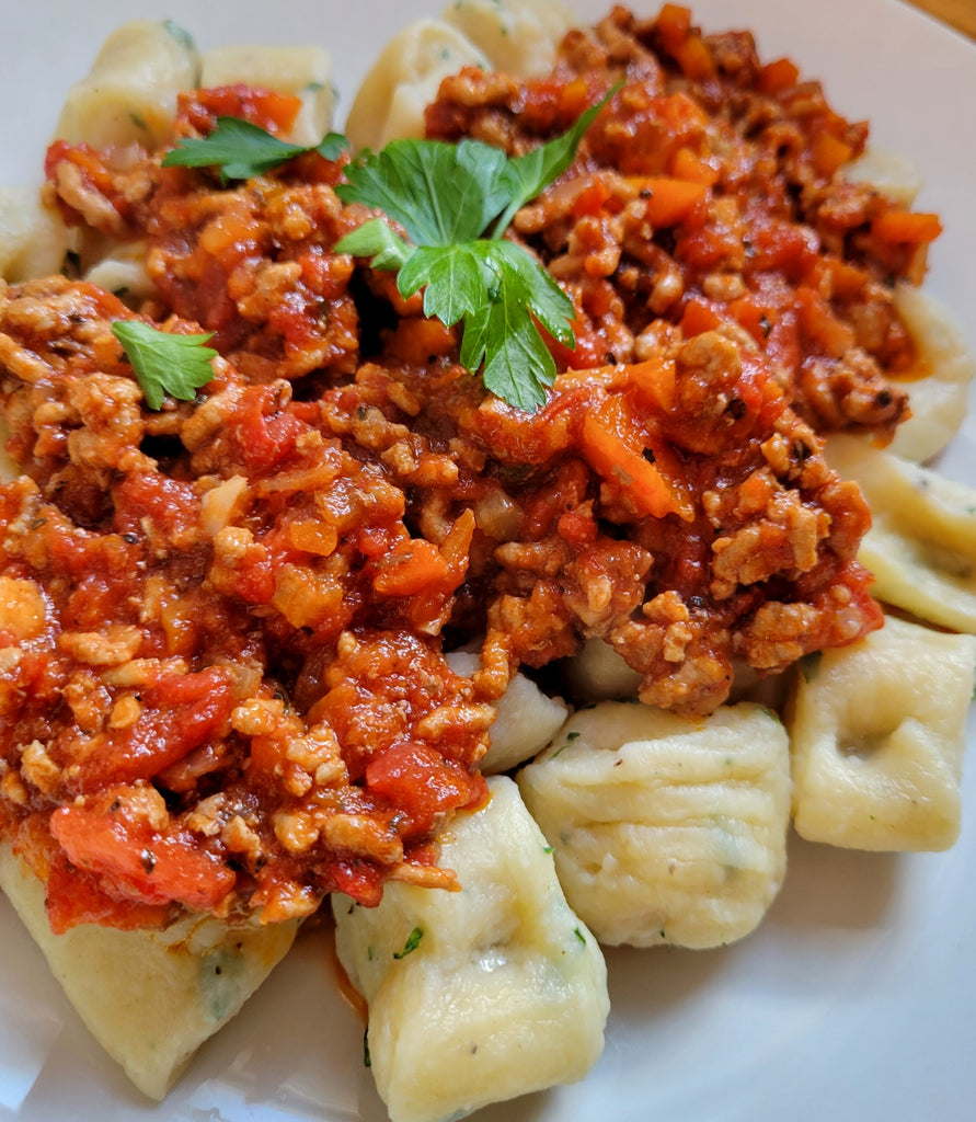 Ricotta Gnocchi with Bolognese Sauce