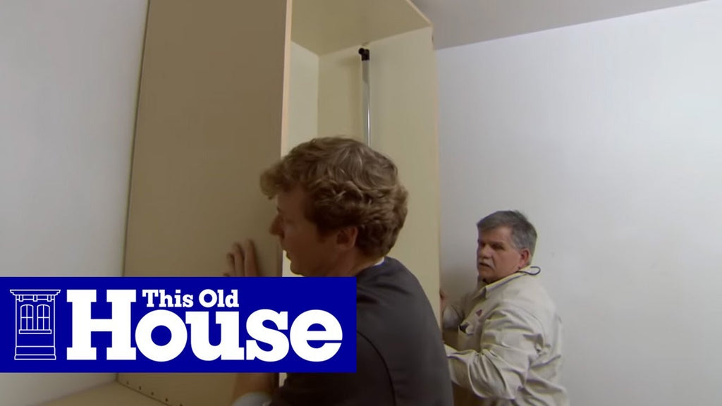 This Old House general contractor Tom Silva and host Kevin O'Connor build a storage system for a walk-in closet